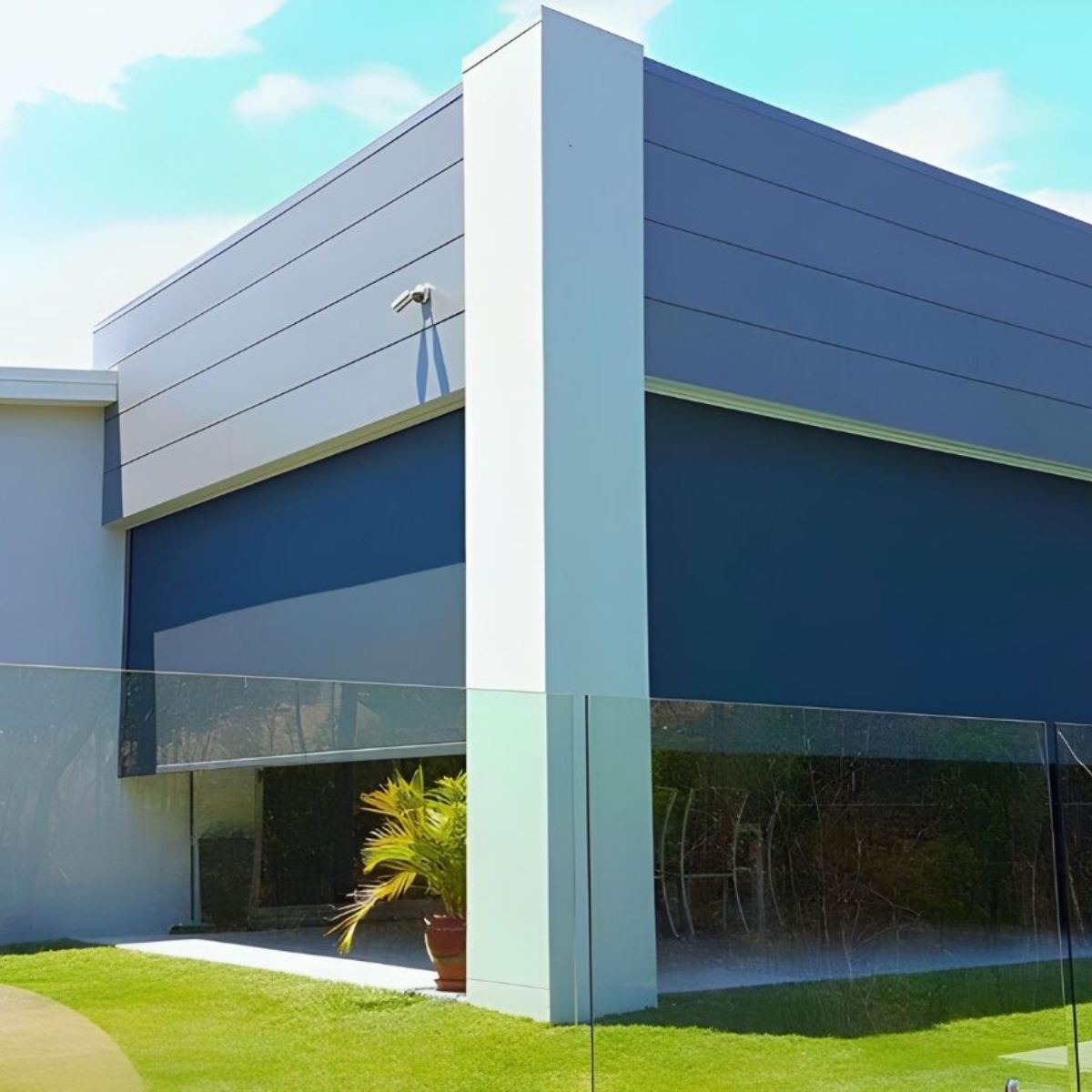 Heavy duty channel outdoor blinds installed on a Brisbane home for wide openings and increased wind protection