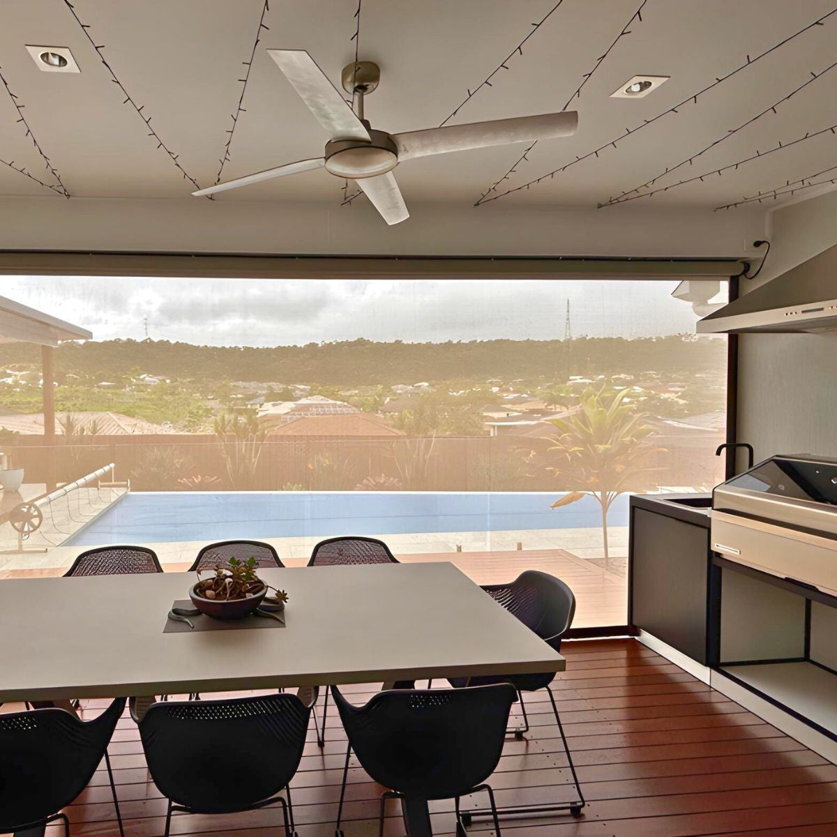Outdoor blinds enclosing a Brisbane outdoor dining area to keep mosquitoes and insects out