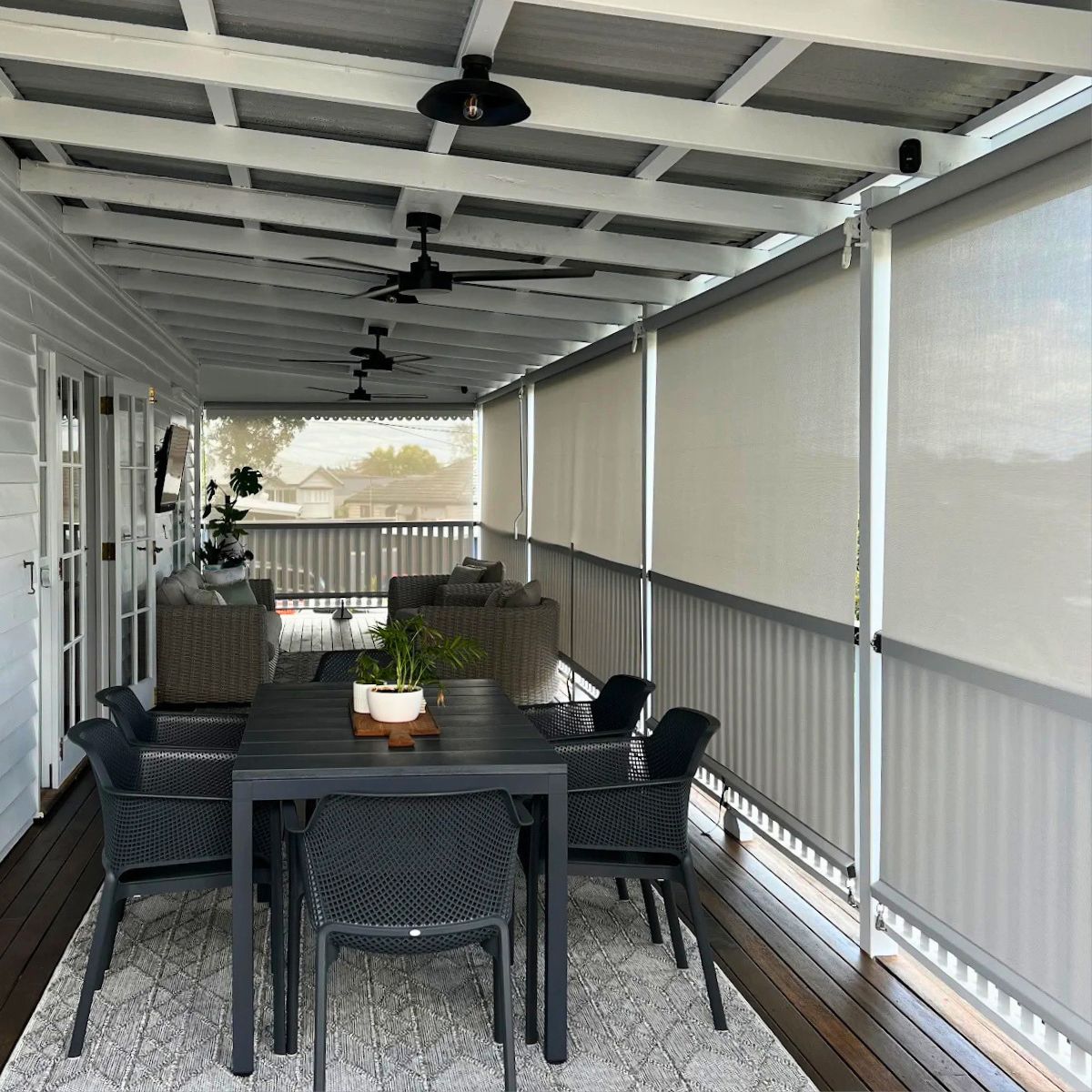 Outdoor blinds installed on a Brisbane veranda by a local in house team, showing custom fit installation designed for Brisbane weather conditions