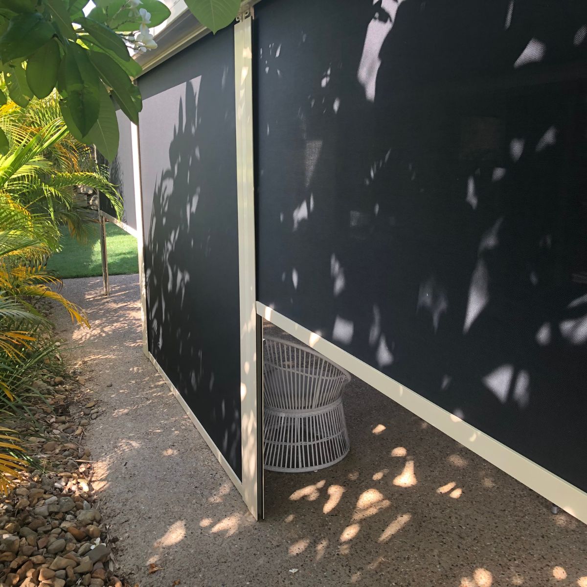 Outdoor blinds installed on a Brisbane property providing privacy from neighbours without blocking light